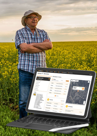 A joyful image of a farmer standing in a field of crops with a HiveIQ software tablet displayed in the foreground. The tablet shows data on the beehives, including the number of frames, temperature, and humidity. The farmer is wearing a straw hat and a checkered shirt, and is surrounded by crops and greenery. This image illustrates the importance of beekeeping in agriculture and how HiveIQ software can provide valuable insights into beehive management, ultimately leading to increased crop yield and quality.
